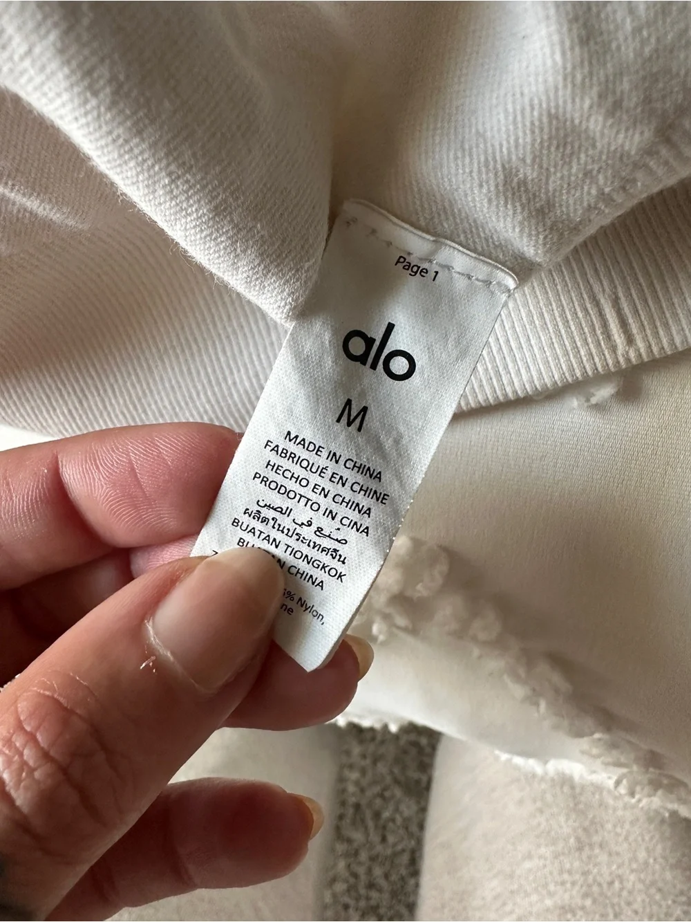 ALO Yoga ribbed seamless low back sports bra, ivory.